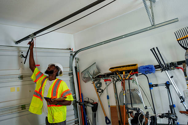 Professional Garage Door Panel Replacement technician working in Cortland County County, NY